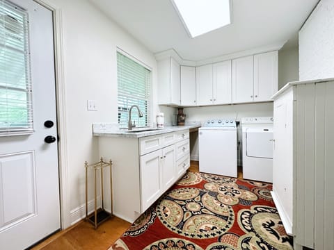 Full in-unit laundry with all the needed essentials for added convenience.