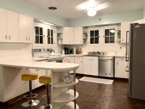 Kitchen - includes cooking utensils, pots, pans, etc. Oh did I mention there is a Nespresso maker with pods provided? And a coffee bar?! 