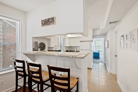 The common open dining area serves also as a good work from home station.