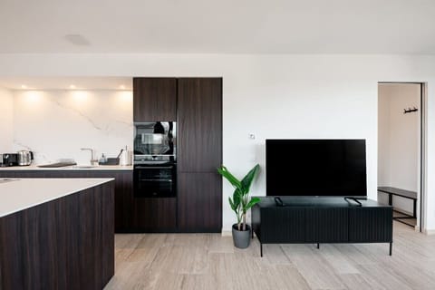 Relax in our chic living space, complete with all the comforts of home.