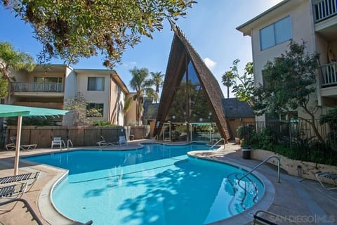 Beautiful shared pool and tropical clubhouse