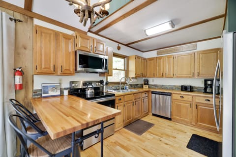 Roomy kitchen w all cookware ready for you! Great coffee maker lots of counter