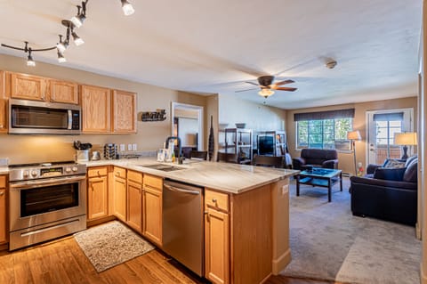 Luxury kitchen with new appliances and quartzite counters.