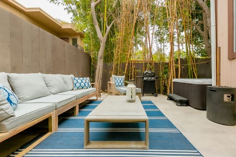 Private outdoor patio with comfortable outdoor living area.