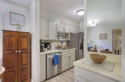 Lots of cabinet space, dishes, glasses, cookware