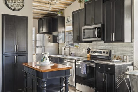 Well-equipped kitchen for cooking and dining during your stay.