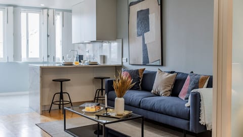 Feel right at home in our bright and spacious living area, that counts with a TV for your entertainment! #stunning #modern