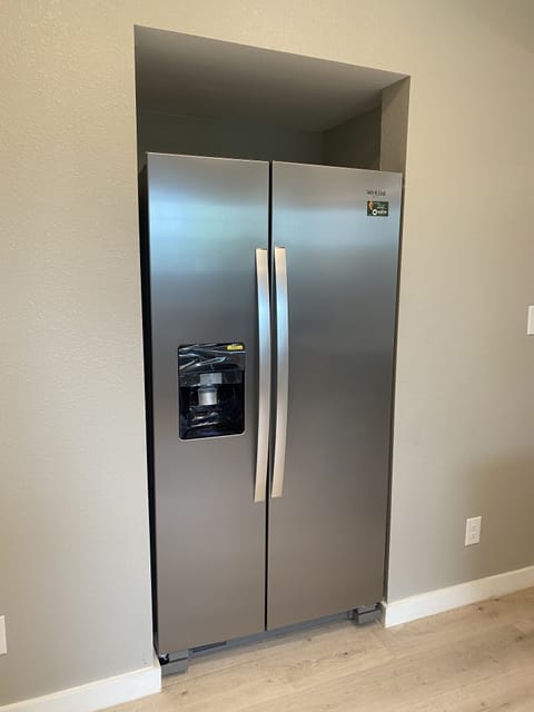 Brand new refrigerator, dishwasher, gas stove/oven, and microwave.