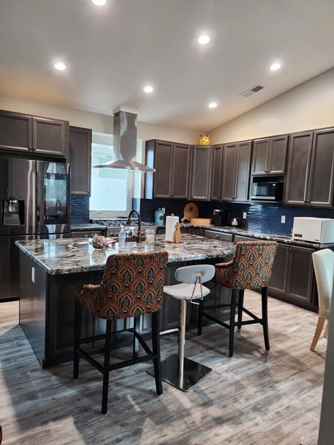 Huge Island in Chef's Kitchen with over-the-top storage and convenience