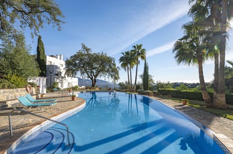 This apartment includes a lovely pool with a great view (1)