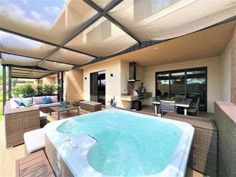 Enjoy the privacy of your own hot tub, bbq grill, and relaxation area.