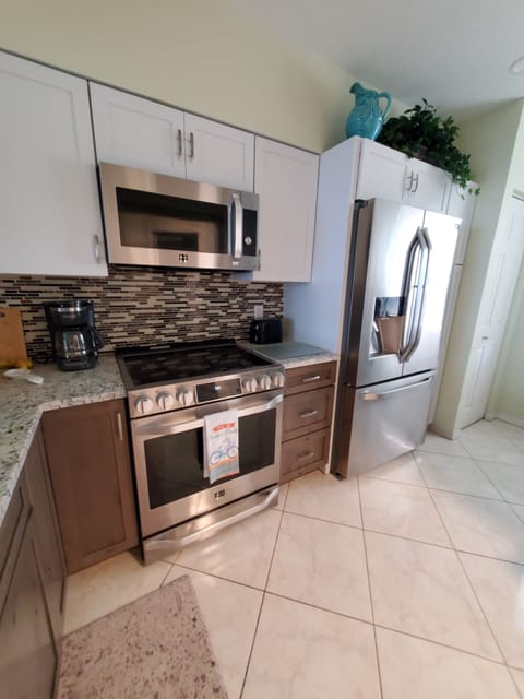 Stainless fridge, stove, microwave and dishwasher. Pots, dishes, linens, cutlery