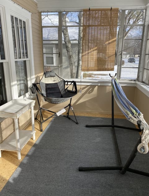 Three seasons porch lounging area.