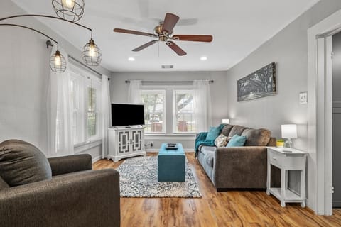 Super cozy living area that includes a sleeper sofa with upgraded queen mattress. (Not shown in photo) There is also a little bistro table for two with chairs. From this intimate setting. you can still easily view the main room tv.