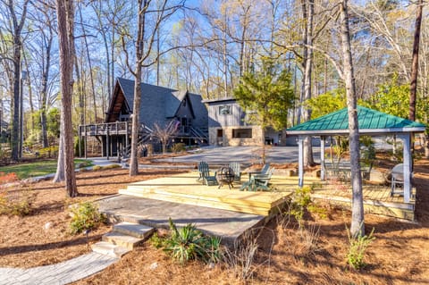 Patio w/ gazebo, grill, dining table & 4 Adirondacks