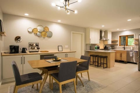 Craft your delicious meals and gather around for great food and company in this kitchen and dining area.
