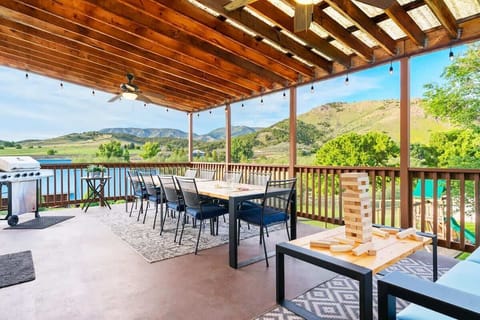 The covered patio and large dining table is perfect for large group meals (and playing games).
