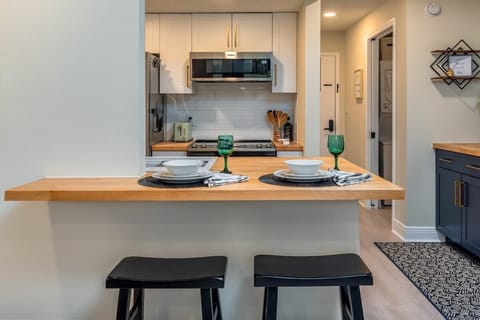 Counter seating for two with open view from the kitchen.