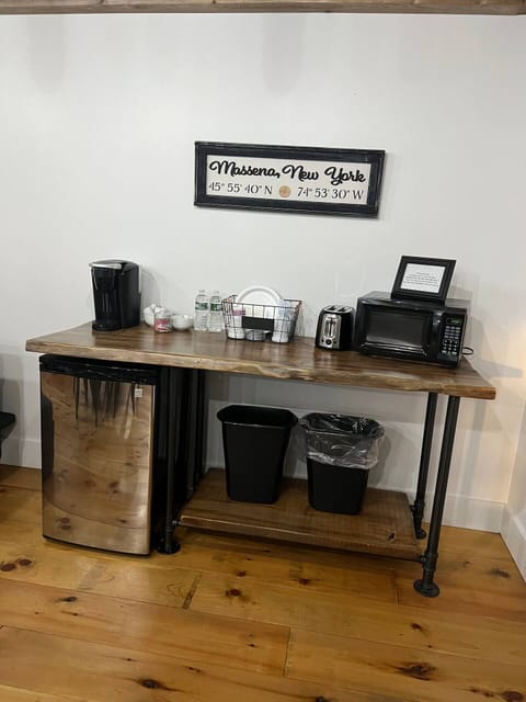 Amenities to warm a meal, make coffee, prepare a snack.