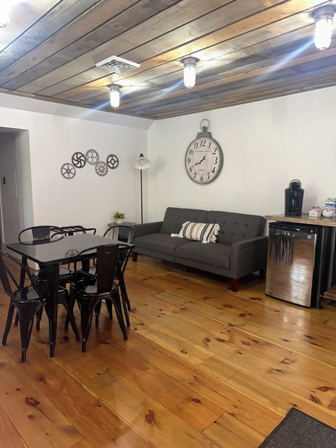 Couch folds down to a small full size bed. 

Table & chairs for dining or games.