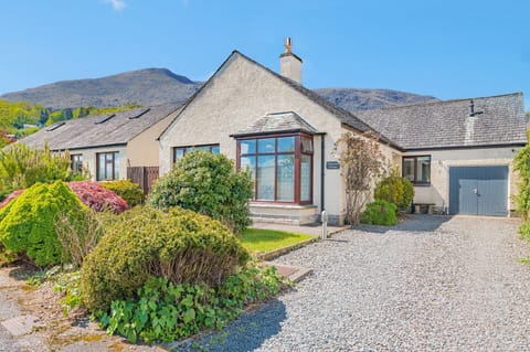 Clemmies Cottage front with Coniston Old Man behind