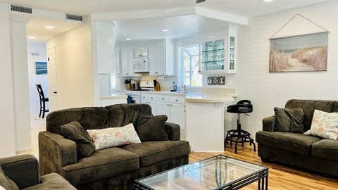 Open concept allows for guest interaction between the living room and the kitchen