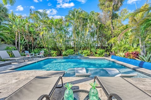 From your chaise lounge, you'll soak in the shimmer of the heated pool and the breezy elegance, feeling instantly swept into effortless beach-luxe living.