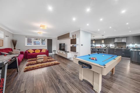 [Games room. Pool table, 32inch TV, Air Hockey]