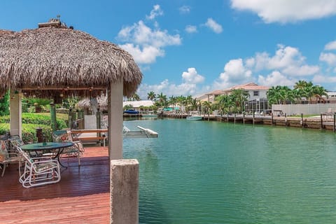 Tiki hut and wide clean canal