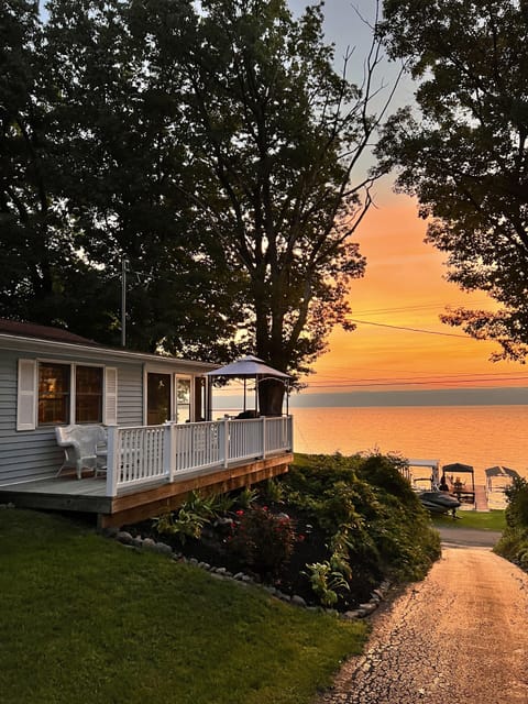 Enjoy the sunrise from the patio, screened in porch or from the private dock