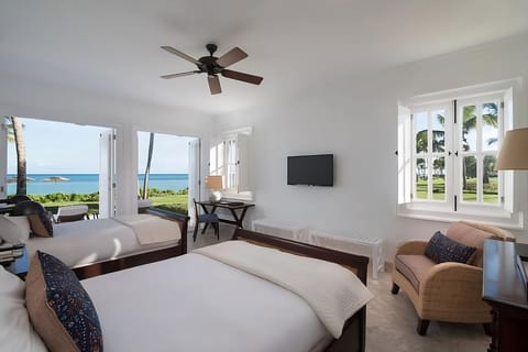 Stretch out in sunlit beds with sweeping sea views.