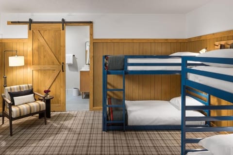 Stretch out in cozy bunks with warm, rustic charm.