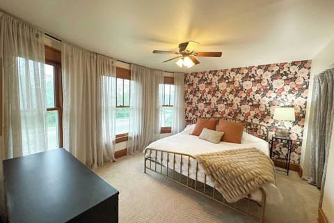 (GUEST BEDROOM) Relax in our deluxe guest bedrooms, featuring king-sized beds, enough closet space, and natural light. These calm retreats are your perfect oasis for restful nights.