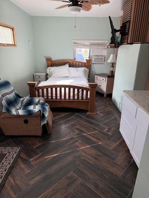 View from bathroom. No recliner but desk instead