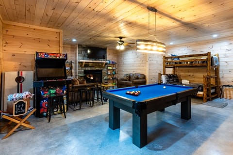 Our basement game room has a pool table, Smart TV, and 4-player arcade with over 4,000 games.
