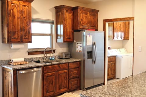 Full Kitchen facing back yard