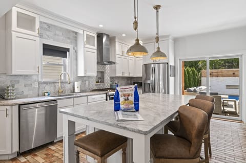 Kitchen with island seating for 5