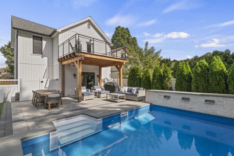 Backyard patio with heated pool