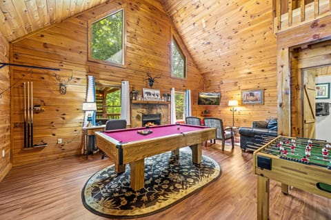 Living room with comfortable workspace.