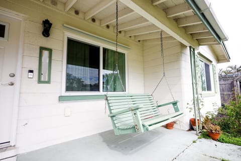 Enjoy the lovely front porch swing
