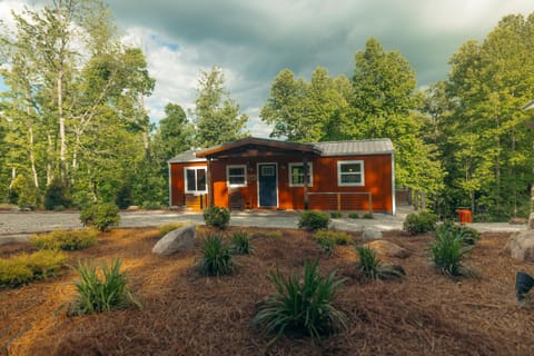 New landscaping and expanded front porch overhang