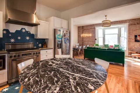 Kitchen view to the second living room and dining area.
