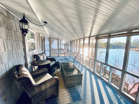 Back porch with beautiful views of the water