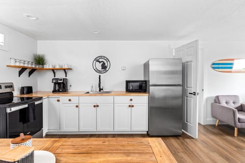 Kitchen and Door to Right Bedroom and Bathroom