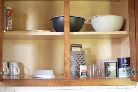 Salt and pepper, grater, measuring cups, bowls, charcuterie board