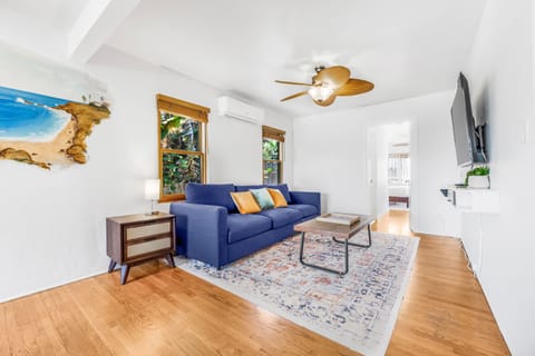 Sofa pulls out to a queen size sleeper for extra guests.