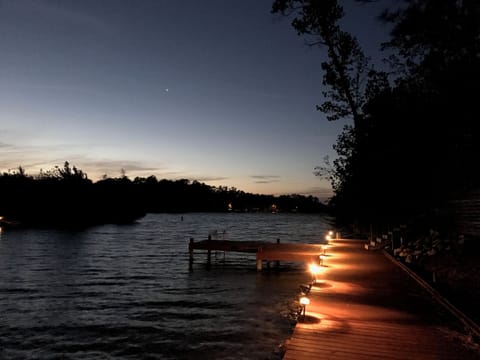 Gorgeous views at night from the private dock and illuminated common boardwalk.