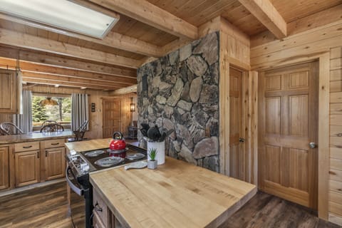 Fully stocked kitchen with electric range