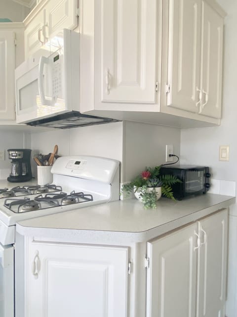 Tons of counter and storage space with many appliances for your enjoyment.