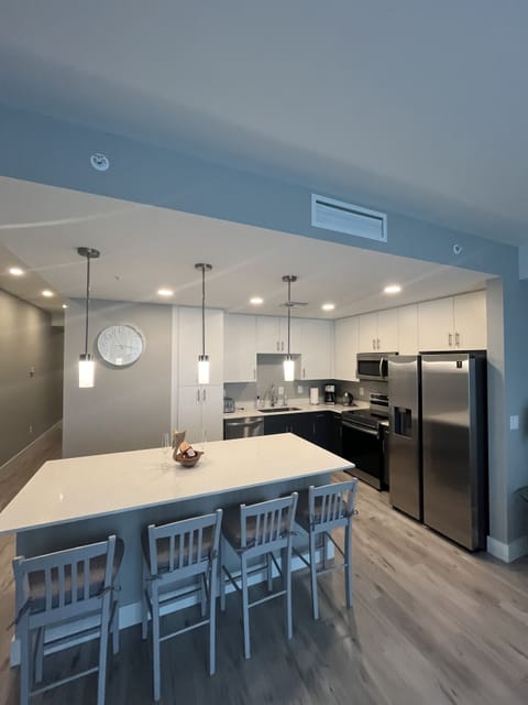 Great kitchen with an island that seats four. 